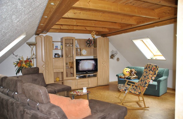 idyllic, sunny apartment at the natural swimming pond and with a fireplace