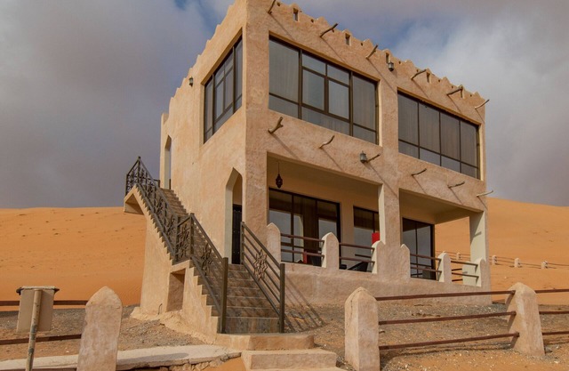 Immerse in ultimate desert elegance with the Sand Suite at Thousand Nights Camp