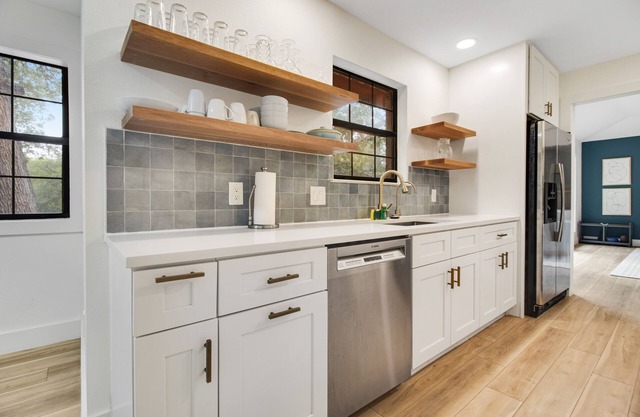 Incredibly spacious home dog-friendly with W/D, kitchen, grill, patio, & games