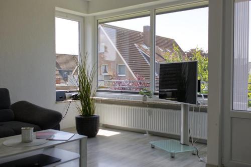 Inselblume 58 - Ferienwohnung mit Balkon in Neue Tiefe
