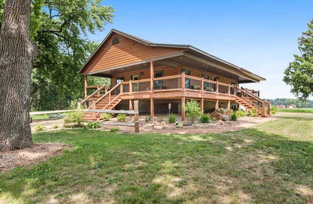 Inviting home with game room, firepit, full kitchen, & W/D