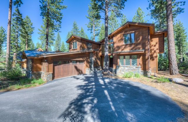 Inviting home with golf course views, large deck, & modern interior