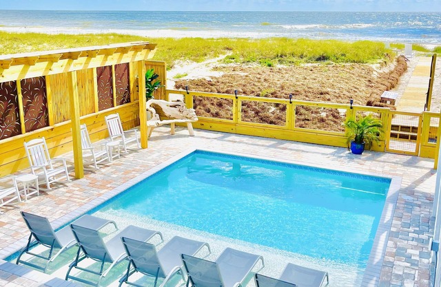 Island Getaway: Beachfront home with amazing outdoor space & private pool!