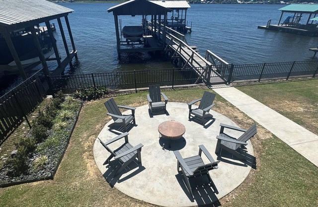 It's About River Time, a 3BR/3BA house on False River, fenced yard & large pier!