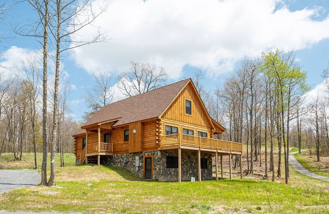 John's Place | Pet-Friendly Cabin, Wooded Views, Minutes to Wisp!