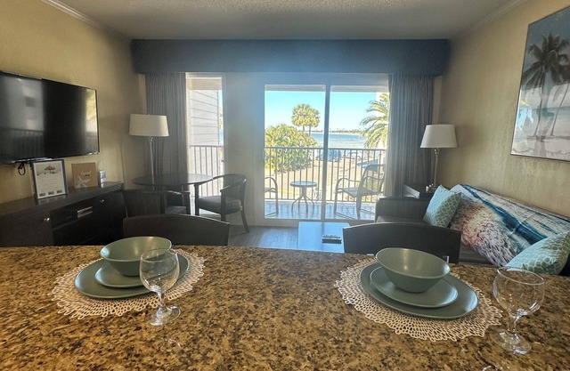 Just minutes from all stadiums with private beach and pool. Beautiful views!