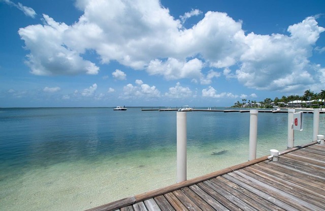 Kaibo Yacht Club 10 - 'Kokomo Kai' - 2nd floor beachfront - by Cayman Villas