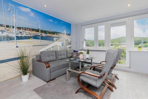 Klimatyczny Nadmorski Apartament z Parkingiem by Noclegi Renters