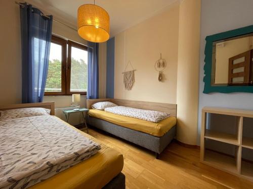 Klimatyzowany apartament przy plaży - 2 sypialnie, basen, garaż, Villa 4 Pory Roku