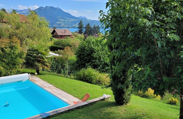 Lake Annecy magnificent new villa standing in front of the lake with stunning vi