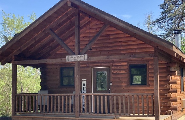 Lake Logan Hilltop Cabin with Hot Tub and Fire Pit