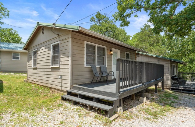 Lakefront 2BR Cabin w/Pool + Swim & Boat dock