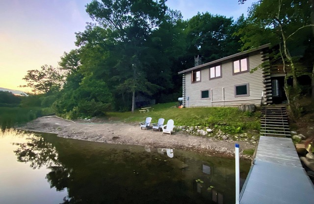 Lakefront cabin with dock, hot tub, fire pit!