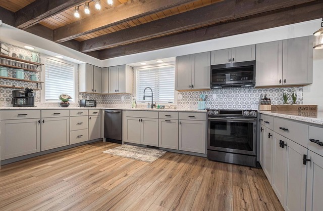 Lakefront, dog friendly, dock slip, hot tub, and fire pit
