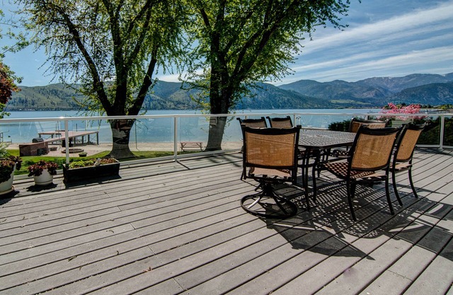 Lakefront home with private dock, firepit, & views