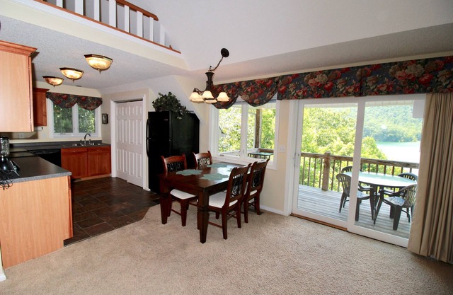 Lakeside Lookout has superb views of Norris Lake, a loft, and its own dock!