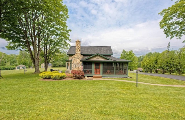 Lakeside Retreat with Guest Cottage on 5+ Acres