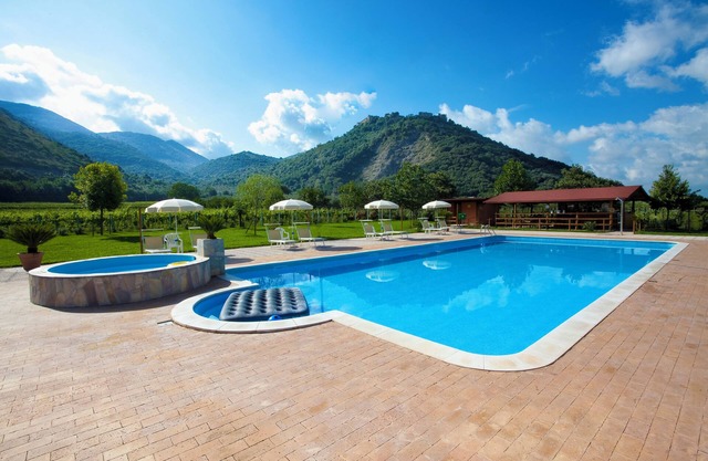 Large apartment in a medieval stone Court, terrace, great view, pool use
