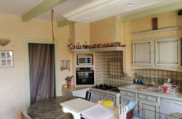 Large country house with swimming pool and playground.