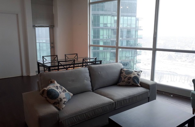 Large Downtown 1 Bdrm condo high rise with city and lake view