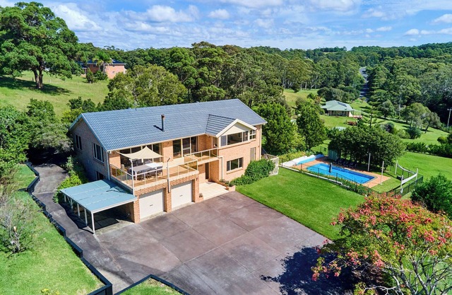 Large family home with Ocean views and pool, situated on acres, minutes.