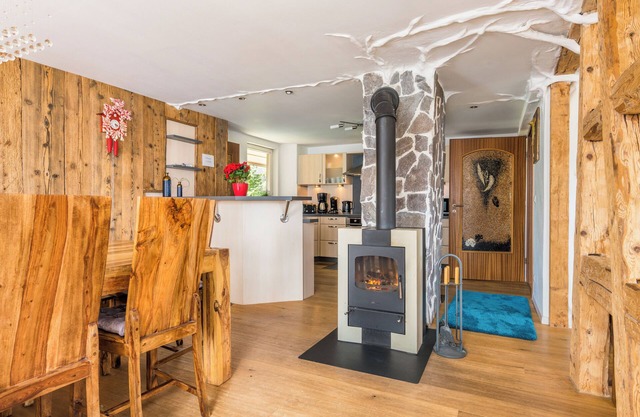 Large historic apartment with sauna, fitness room, fireplace, fire pit and garden