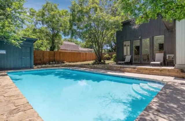 Large home centrally located with pool and games room.