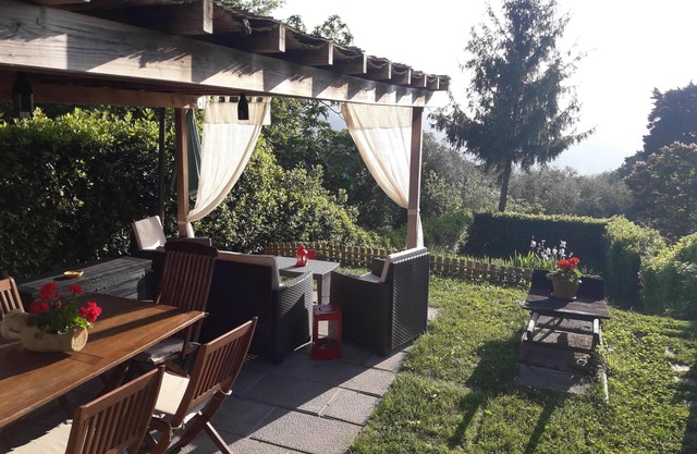 Large portion of ancient stone countryhouse on the hills north of Lucca. Private garden. 10 km from Lucca.