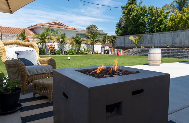 Large turf yard, putt putt, soccer net, fire pit, gas grill & more!