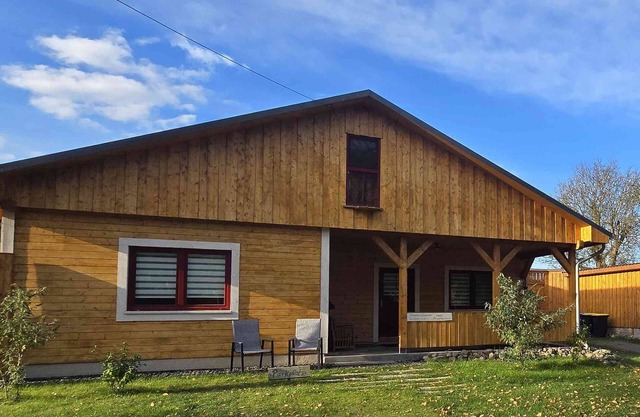 Large wooden house with sauna, in a quiet location by the bathing lake