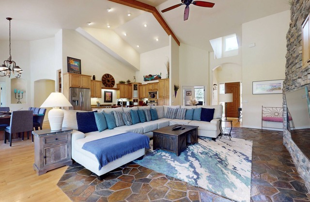 Lavish home with dual living areas & golf course views near skiing and dining