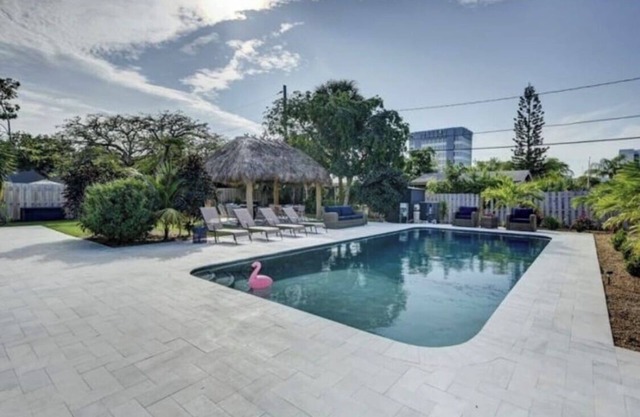Less than a Mile to the beach! Walk to shops and beach! Villa pool house dream!