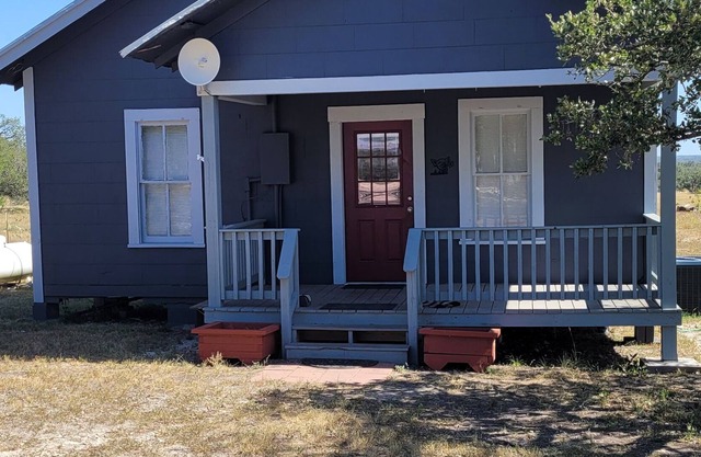 Little 1950's country cottage is peaceful and simple.