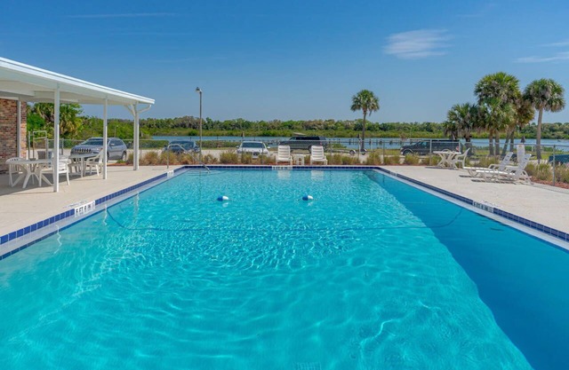 Live it up "Florida Style" with an included golf cart.