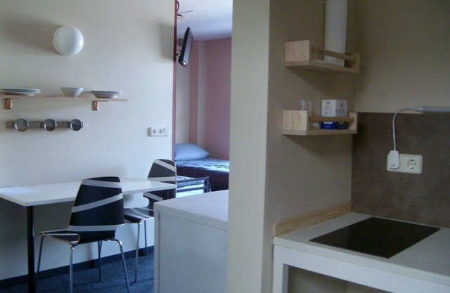 Living in modern apartments - with a culture cafe, vegetarian cuisine and more .