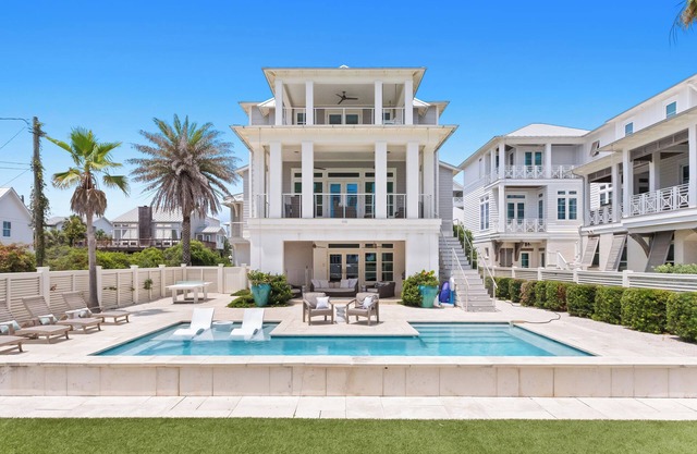 Loaded All Suite Home with Gulf Views, Pool, Elevator, Putting Green, and more!