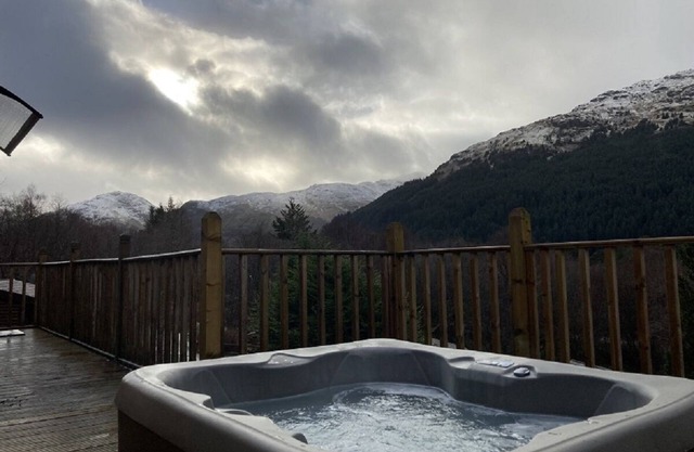 Loch Eck Cabin Retreat with Hot Tub and Sauna Stunning views beautiful location
