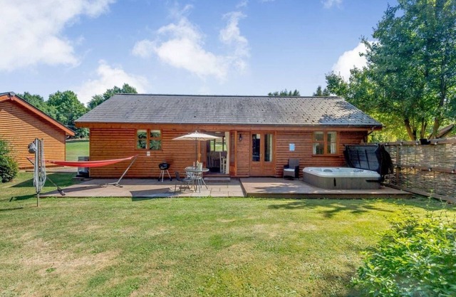 Lodge with one king-size double with en suite shower.
