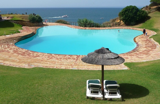 Lovely 4 bedroom villa surrounded by patios in peaceful luxury resort by the sea