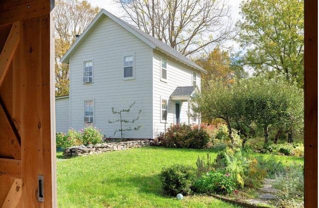Lovely cottage on quiet country road in Millerton, New York, on 23 acres.