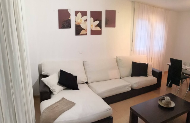 Lovely ground floor with garden and terrace in urbanizac with pool
