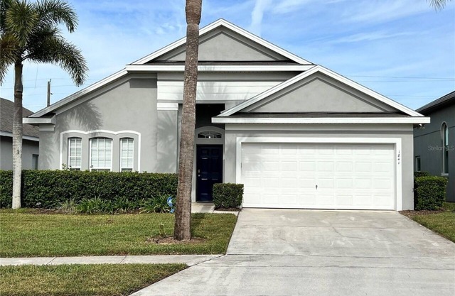 Lovely home near Disney with a Heated pool and game room in a resort community.