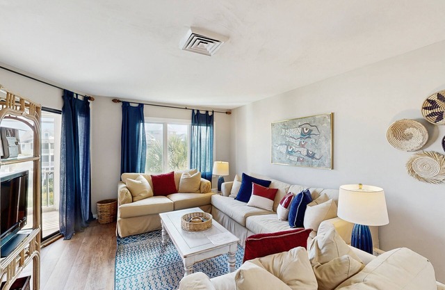 Lovely top floor villa in Wild Dunes with partial ocean views, pool, & W/D