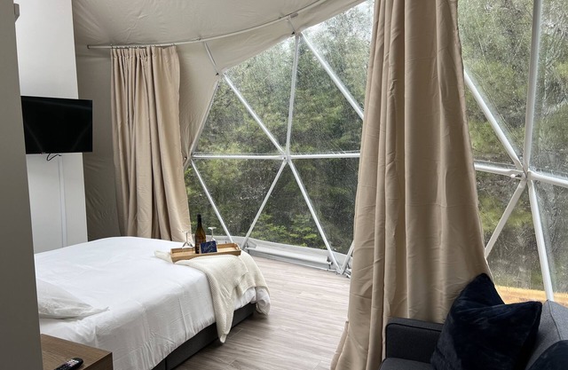 "Luxurious Escapes Await: Private Hot Tubs and Kayaks at Norse Geodesic Retreat"