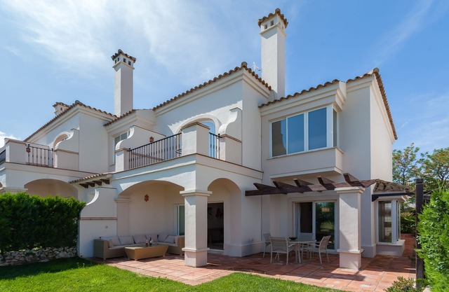 Luxury 2 bedroom Frontline Golf Townhouse with shared pool in a gated community