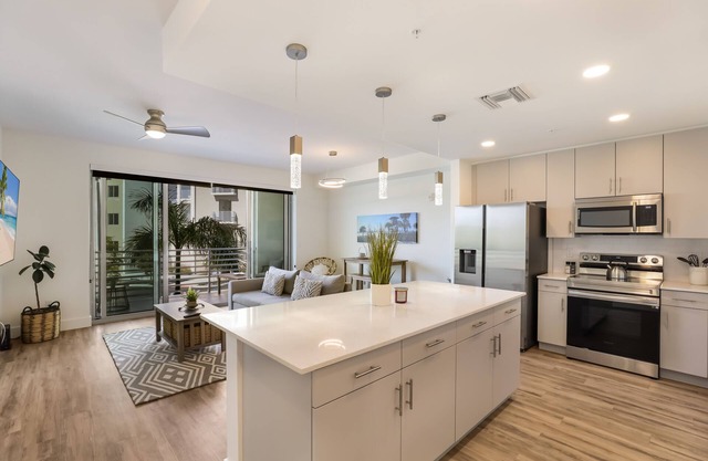 Luxury Condo with Xtra Large Patio & Pool Views