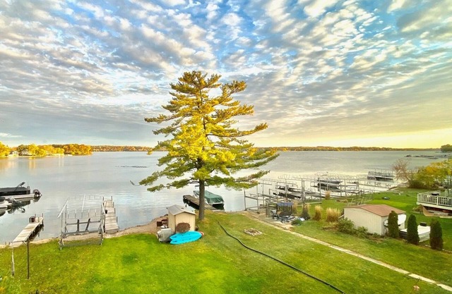 Luxury Lakefront Home w Miles of Lake Views, private pier, lake toys & game room