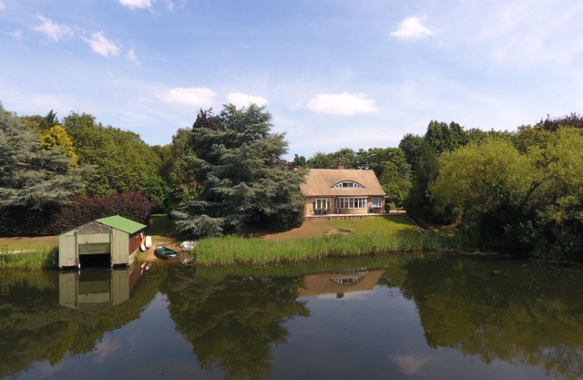 Luxury Lakeside Home In extensive grounds with boats, canoes and tennis court.
