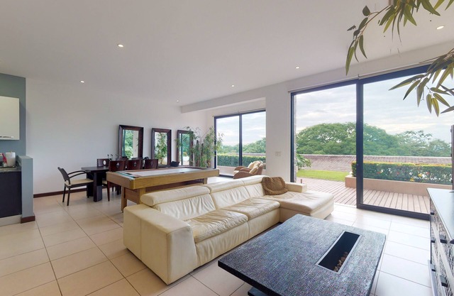 Luxury ocean view condo with comfy tub & shared pool