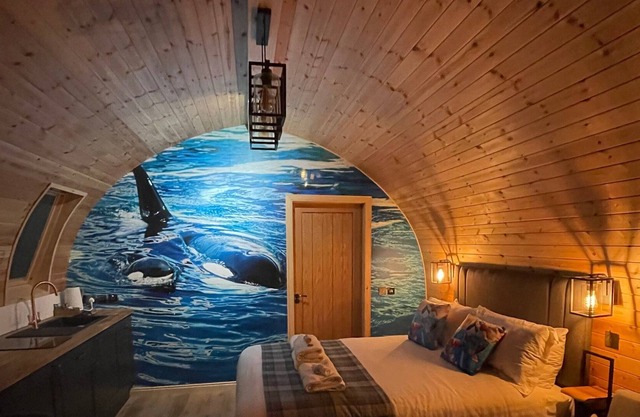 Luxury seafront glamping pod with private patio and Hydropool Jaccuzi